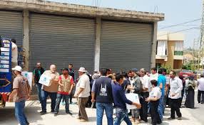 200 محل تجاري يوزعون قسائم غذائية للسوريين